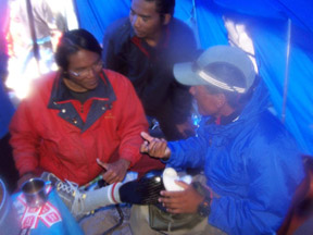 Nawang proudly shows off his high-tech prosthetic leg to other expeditions at Everest Base Camp.